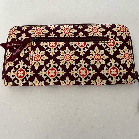 Vera Bradley wallet. Zip outer compartment and slide in compartment. - Picture 2 of 3